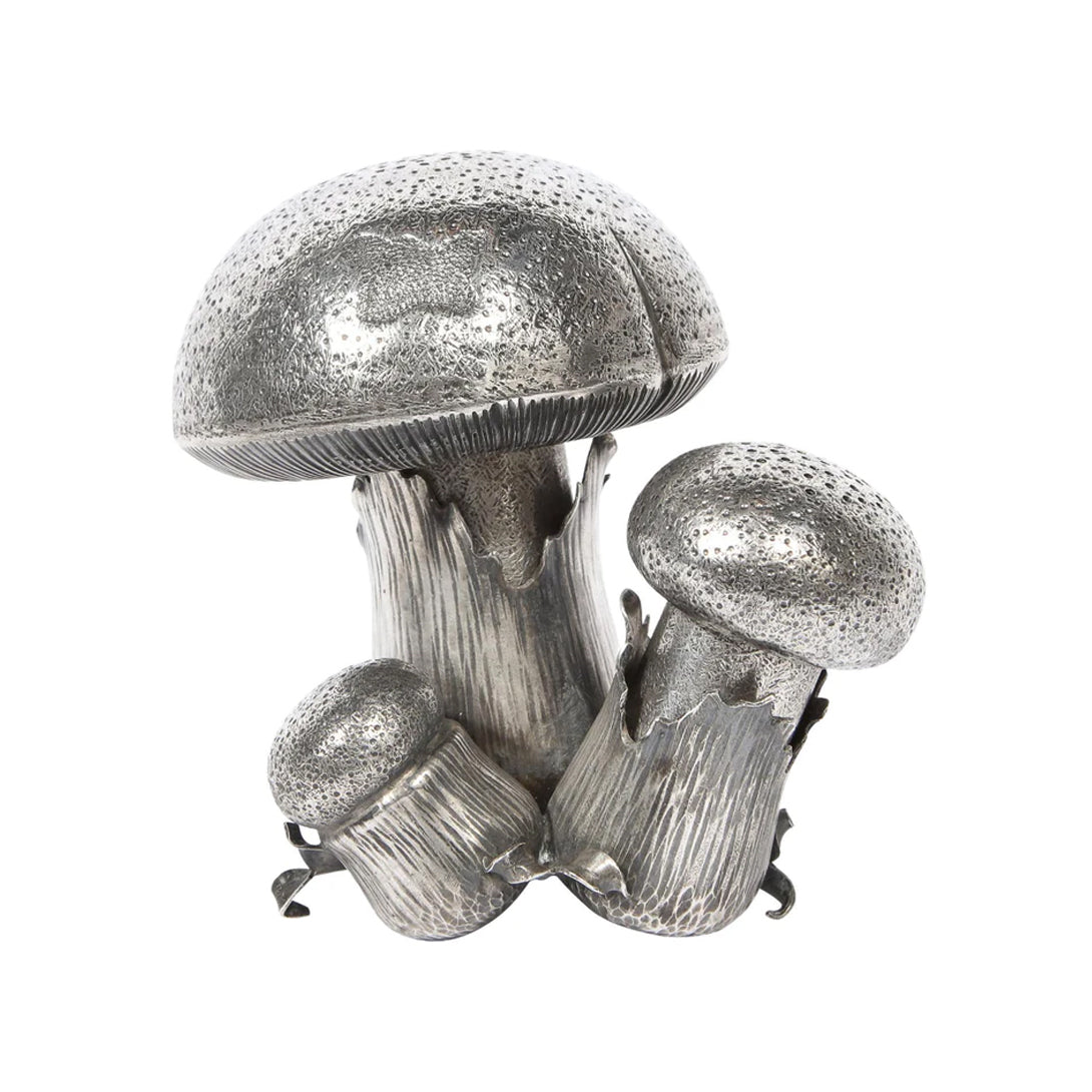 Exquisite Buccellati Salt and Pepper Mushrooms set, crafted from sterling silver with a detailed textured finish that enhances the realistic mushroom shapes. This luxurious duo is designed to add a sophisticated touch to any dining experience.