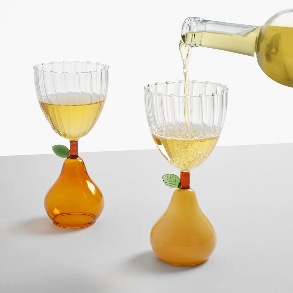 pear glasses ichendorf Milano lakeview home lifestyle image of white wine pouring into glass